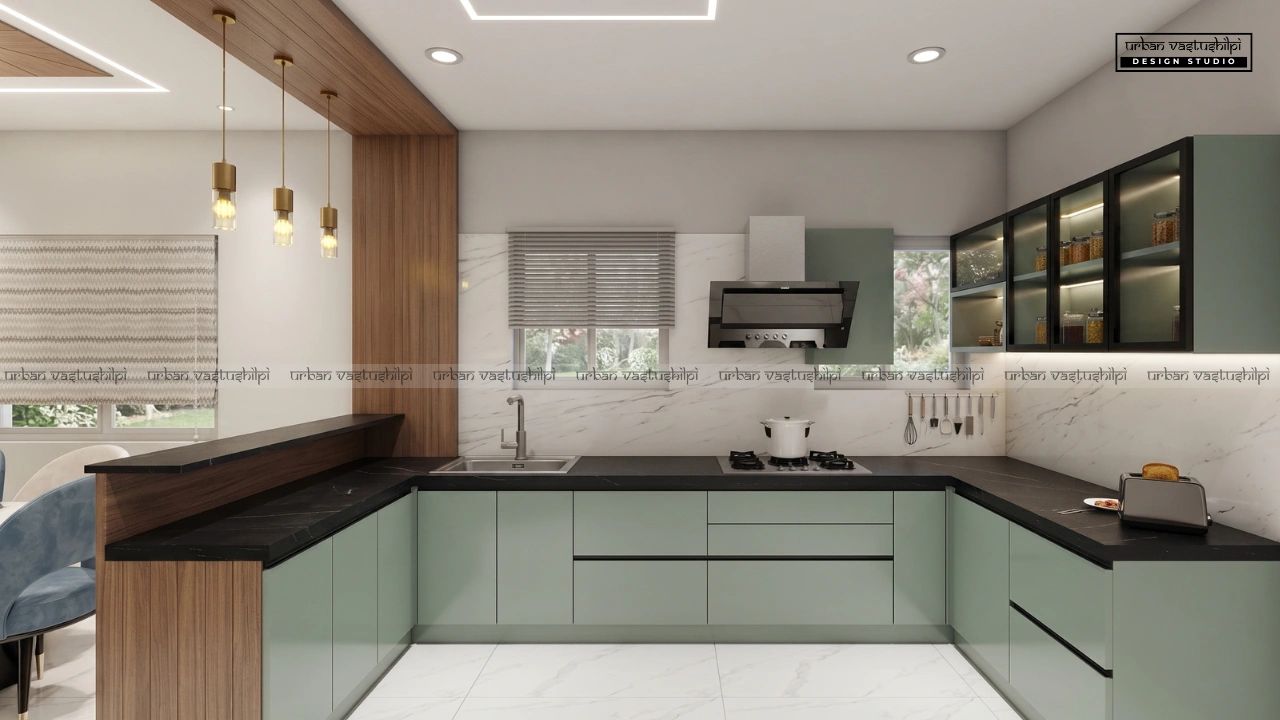 Modern kitchen with sleek green cabinets and black countertops.