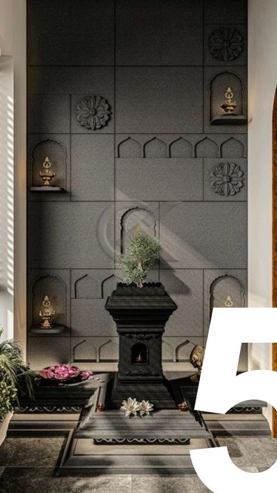 Elegant indoor prayer altar with traditional lamps and decorative plants.