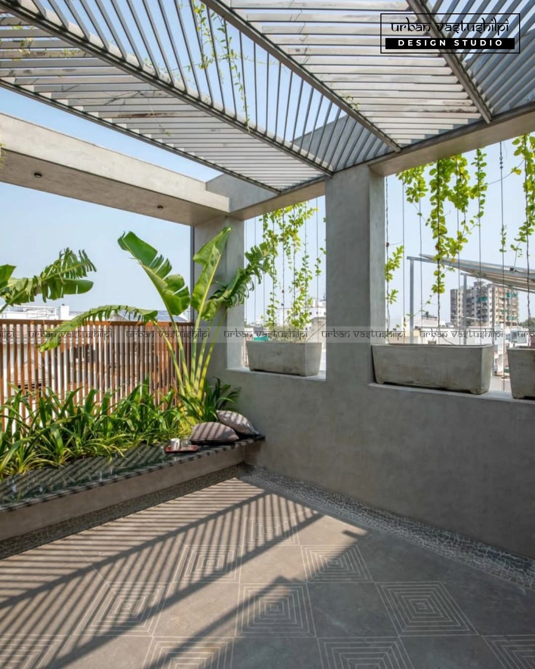 Modern rooftop garden with hanging plants and natural light.