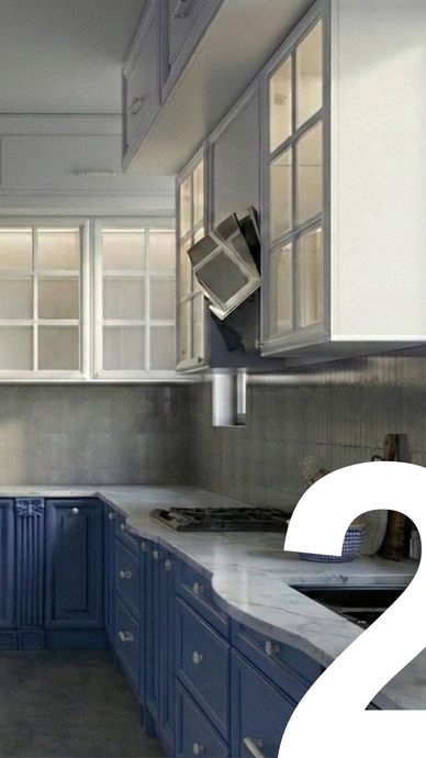 Modern kitchen with blue lower cabinets and white upper cabinets.