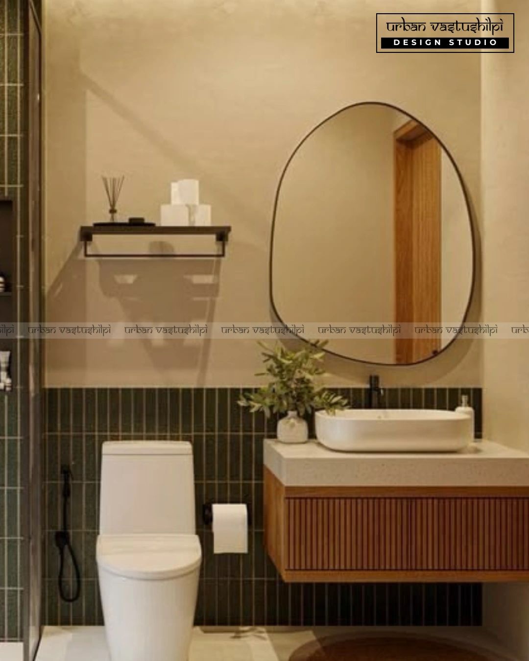 Modern bathroom with a sleek toilet, floating vanity, and an asymmetrical mirror.