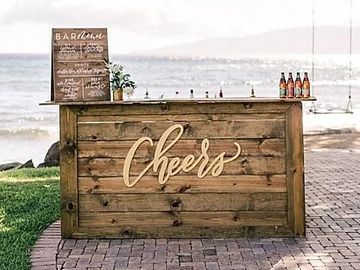Wooden bar with cheers lettering