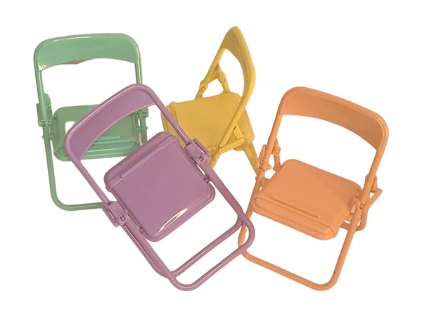 Folding chair cell phone accessories.  In colors green, purple, pink and yellow.