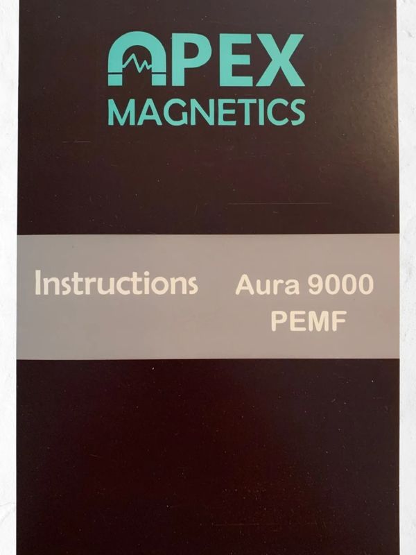 Aura 9000 Instructions booklet, top view showing cover of the booklet.