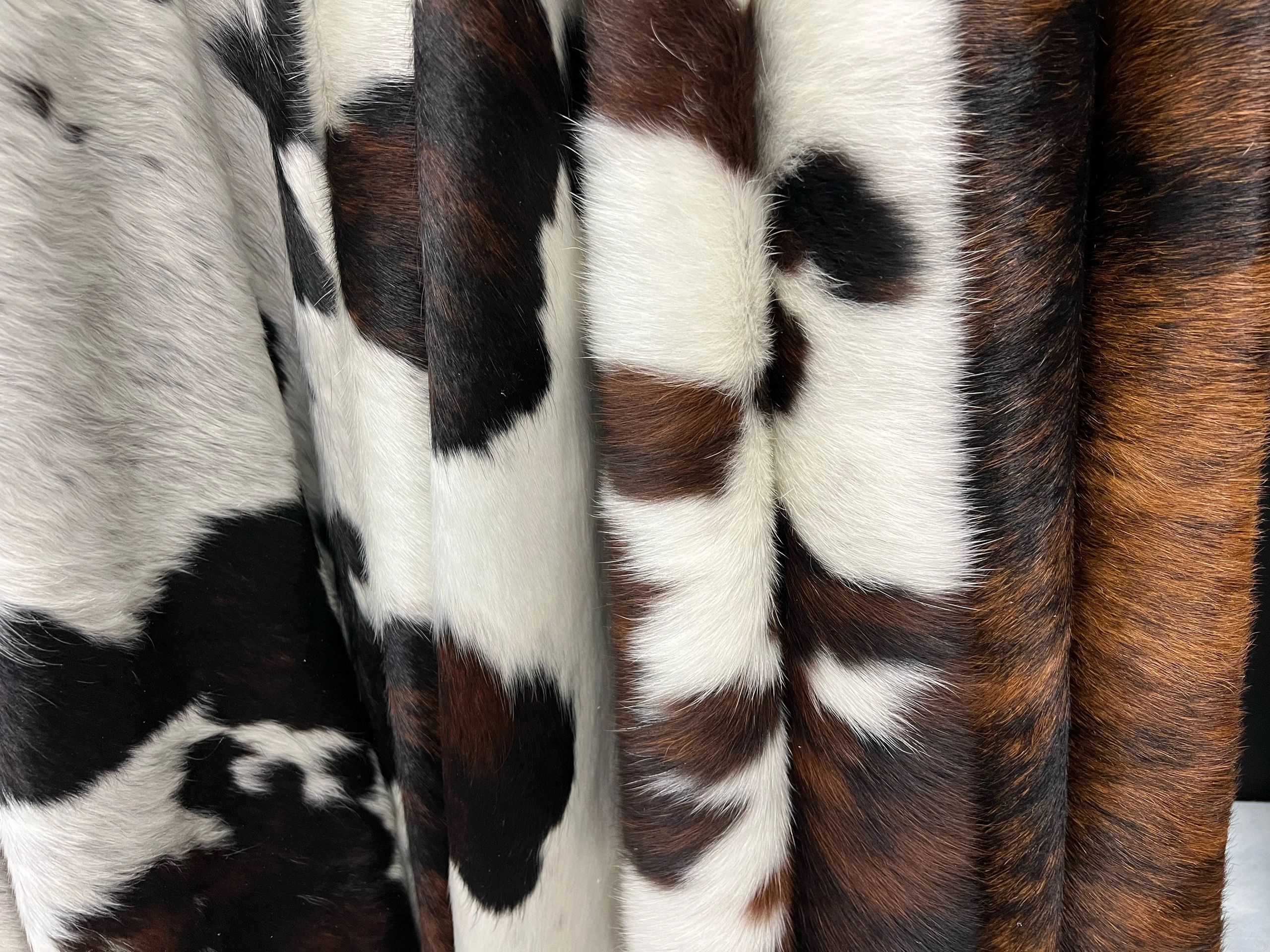 How can you tell if cowhide is real?