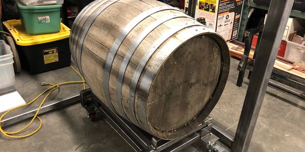 Our custom low profile wine barrel cart. Keeps the barrel low and portable.