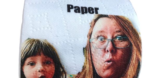 Toilet paper roll featuring surprised faces of a woman and a child with text 'Paper'.