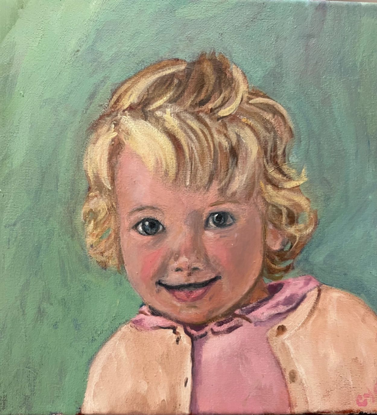Portrait painting of a smiling young child with blonde curly hair.
