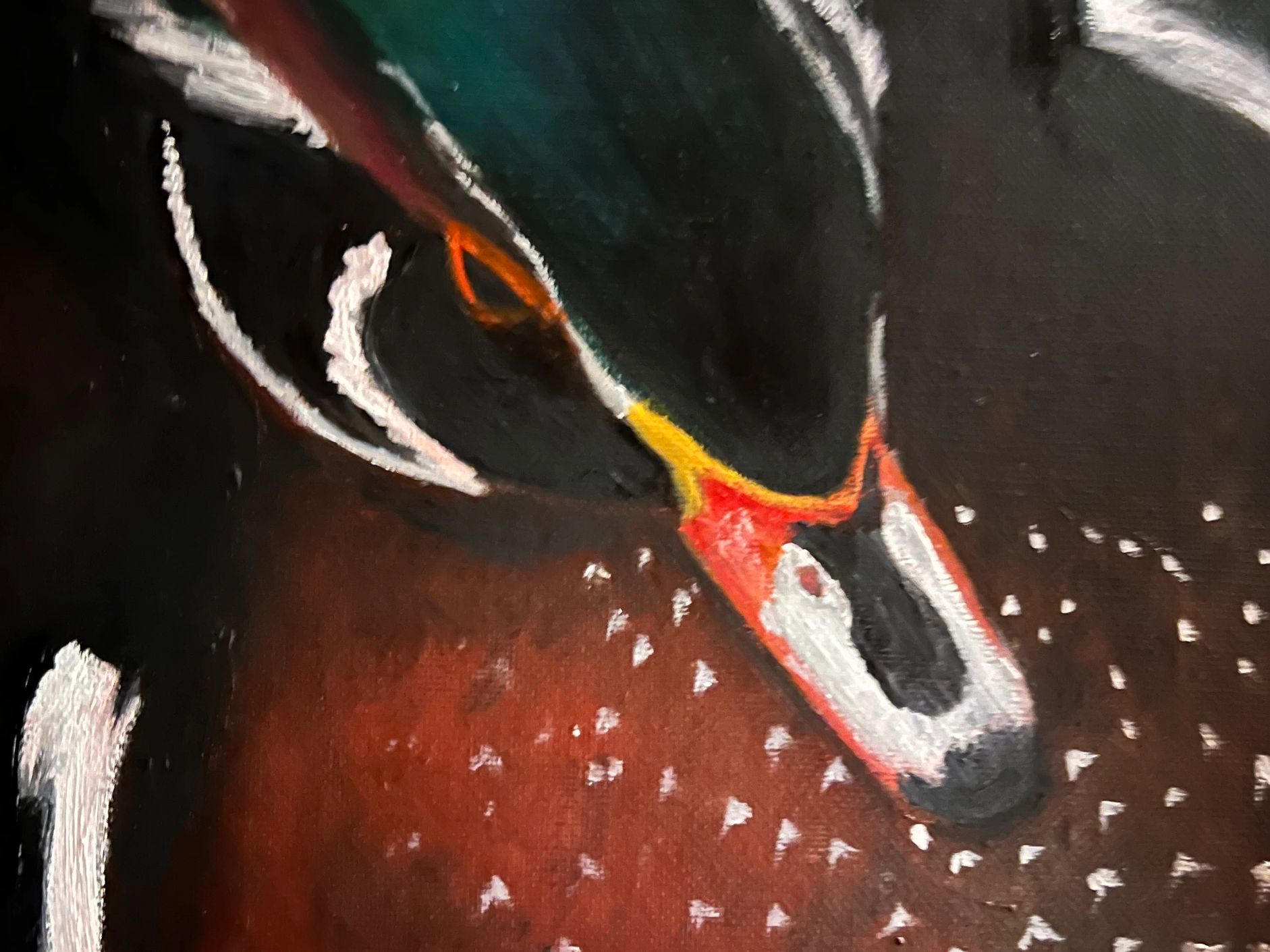 Close-up of a colorful bird painting focusing on the beak and eye.