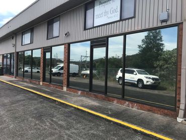 shop window tinting with reflective film for privacy, heat reduction, and a modern finish gosford