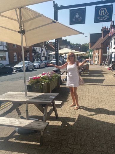 Standing outside the Queen's Head in Pinner.