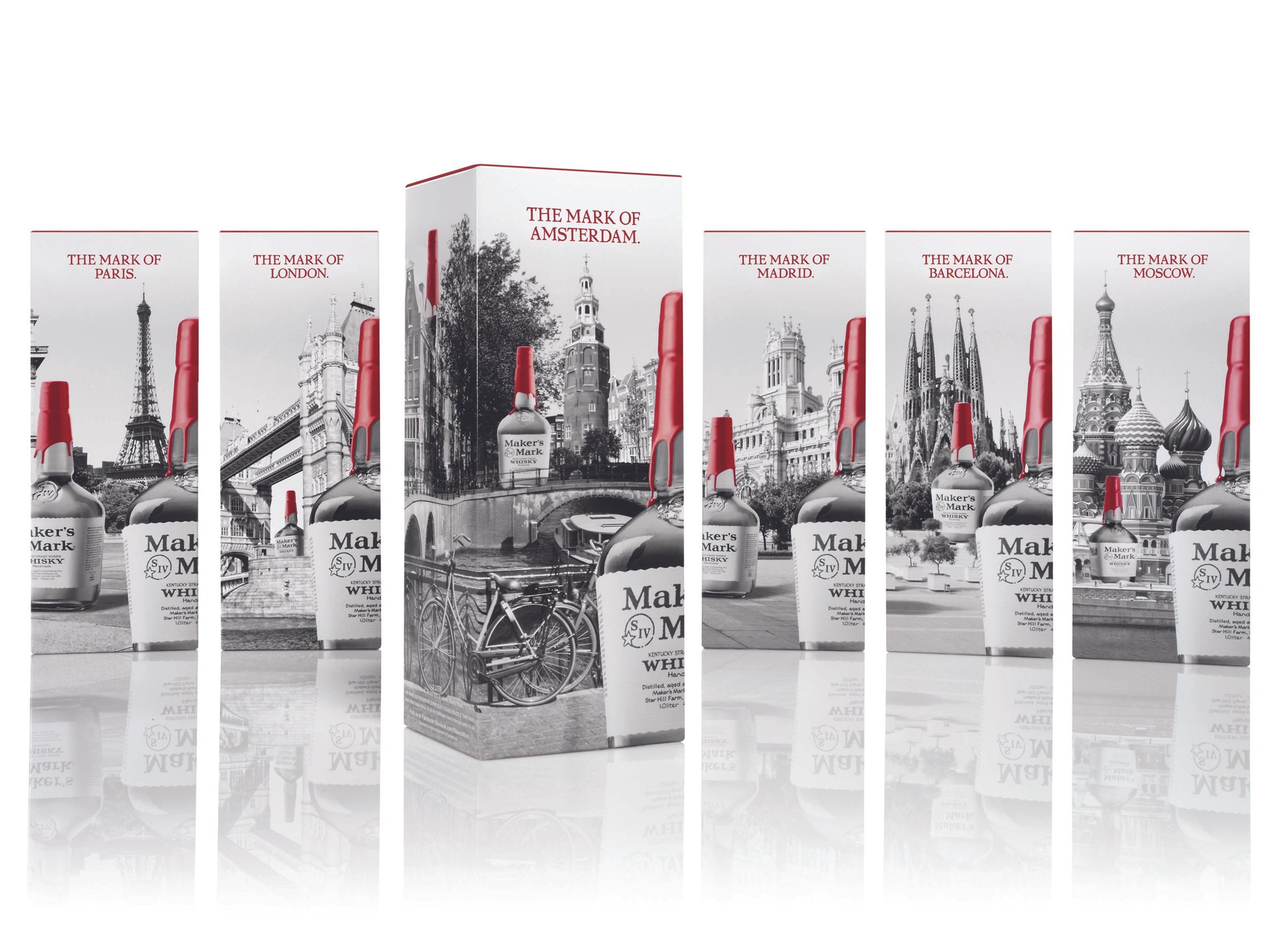 Maker's Mark whisky packaging featuring iconic landmarks from major cities worldwide.