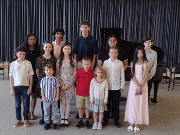 Pianist practicing on upright piano