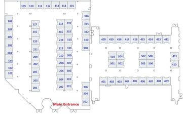 Floor plan showing room numbers and a marked main entrance.