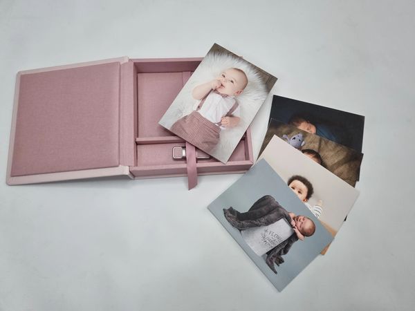 pink folio box with older baby portrait boy in dungarees cannock staffordshire photographer