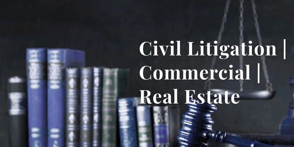 Law books and gavel with scales of justice