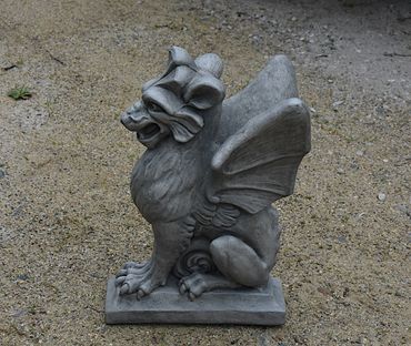"West End" Gargoyle Stone Garden Statue.  Seated winged gargoyle sculpture.