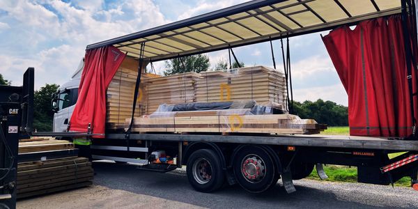 SIP garden room kit loaded on a lorry