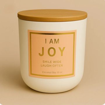 I AM JOY luxury affirmation candle in cream matte jar with peach and gold label, coconut soy 10 oz.