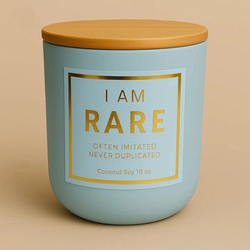 I AM RARE luxury affirmation candle in matte light-blue jar with gold trim label, coconut soy 10 oz
