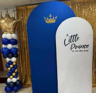 Blue and white party decorations with a 'Little Prince' theme.