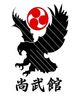 Black eagle with red circle and Japanese text.