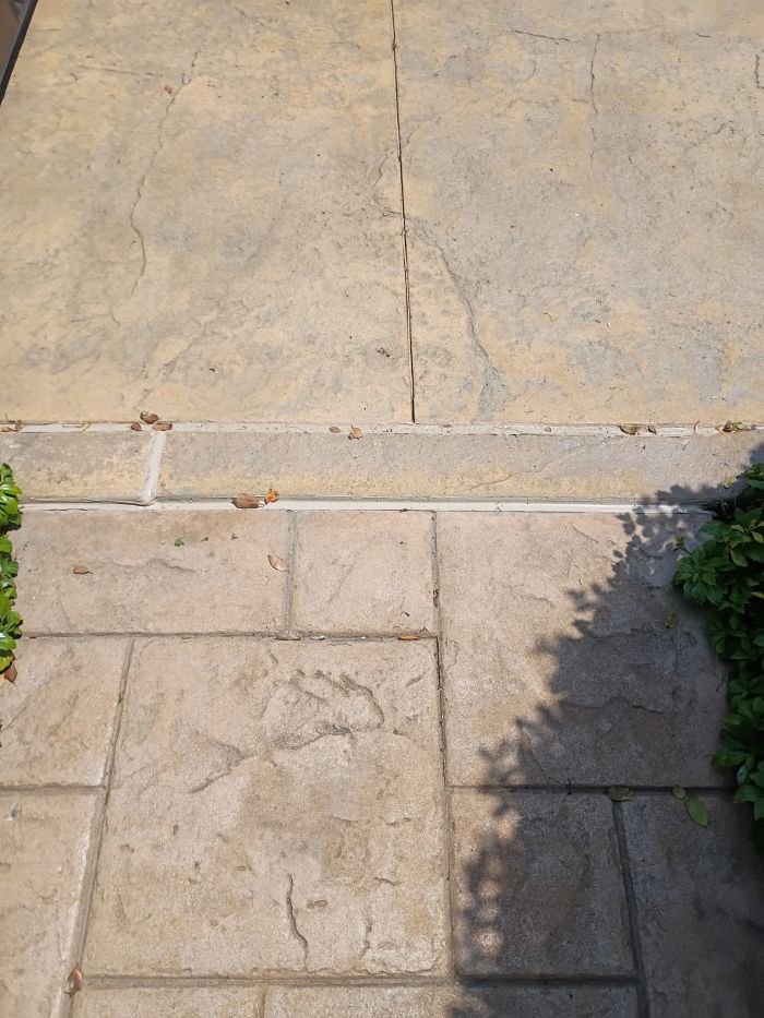 Stamped concrete with a caulked joint