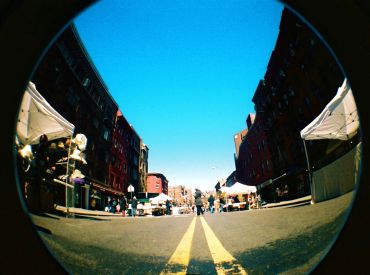 Fisheye view of an urban street market.
