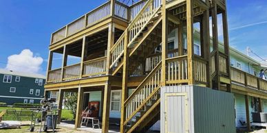 Kure Beach large deck renovation and full interior remodel by NC Hammer Construction.