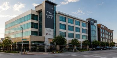 Modern office building named Two Alliance Center.