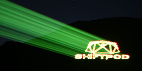 Laser Logo with distributed scanning on mountain 1/2 mile away