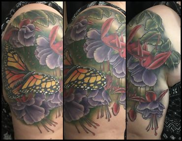 Butterfly and flowers tattoo on shoulder