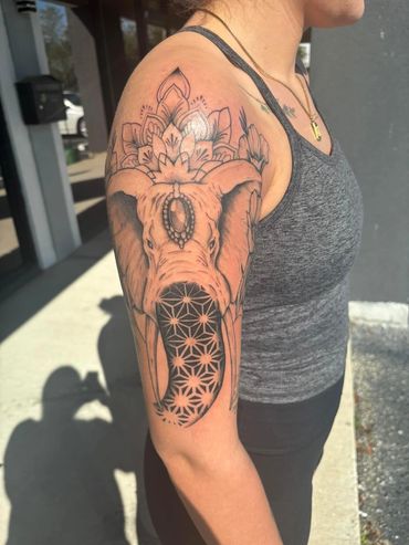 Elephant tattoo on shoulder