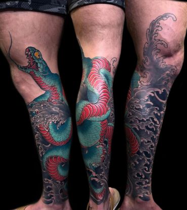 Traditional Japanese snake and finger wave leg sleeve tattoo