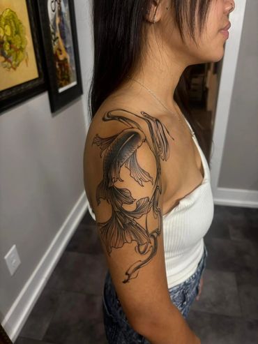 Fish tattoo on shoulder