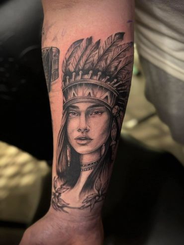Native American woman tattoo