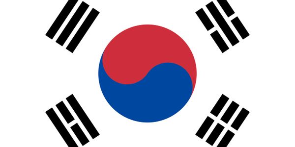 The flag of South Korea with its distinctive yin-yang symbol and four trigrams.