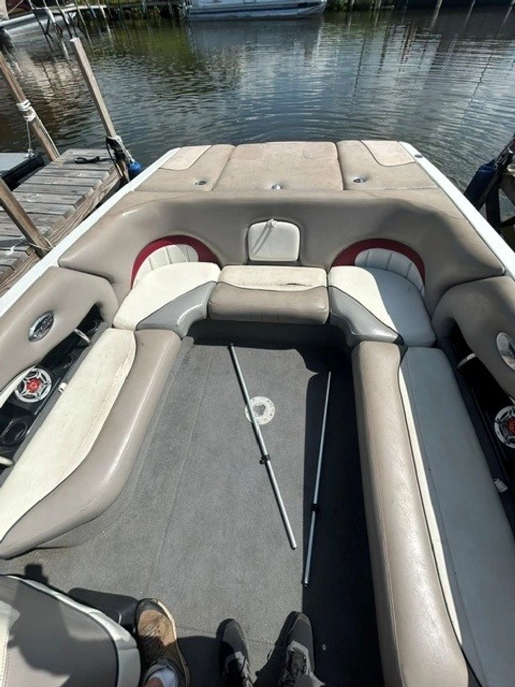 Empty boat seating area near dock.