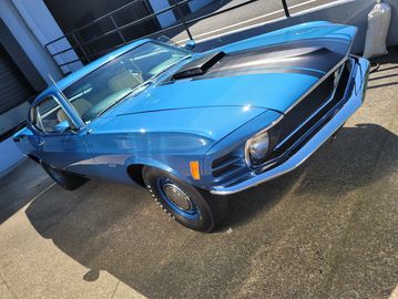 Blue classic Ford Mustang Cobra Jet 428 muscle car.