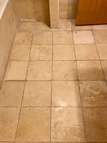 Re-grouting, Thinset clean-up, replacement of broken shower door bumper, custom milled & installed