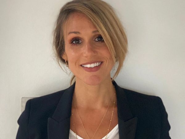 Kate Hopewell in a suit