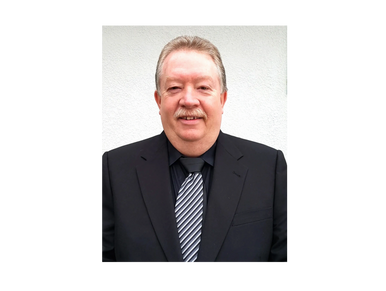 A portrait of Ian Mcgregor on a white background 