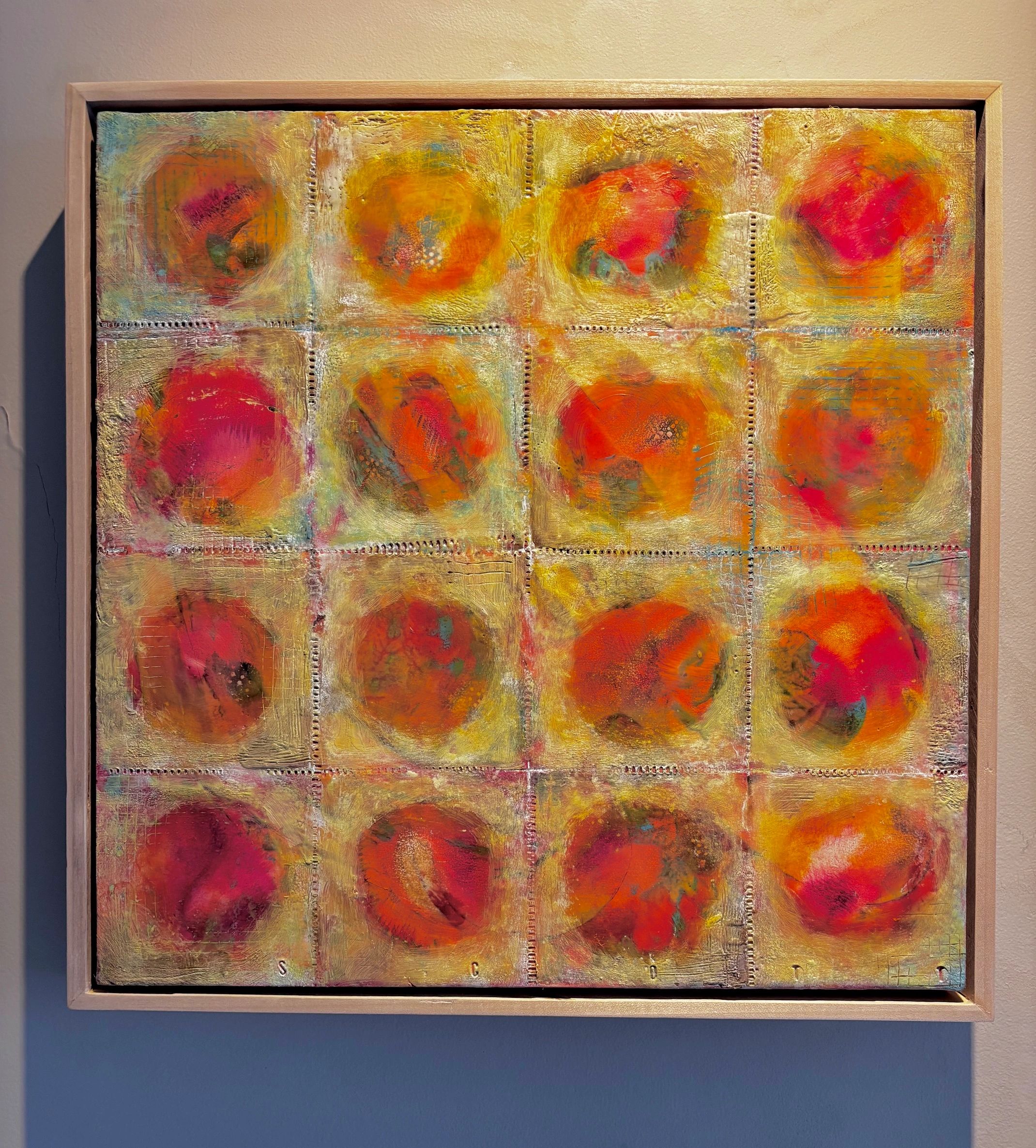 Abstract artwork with vibrant red and orange circular patterns divided into sections on a textured gold background.