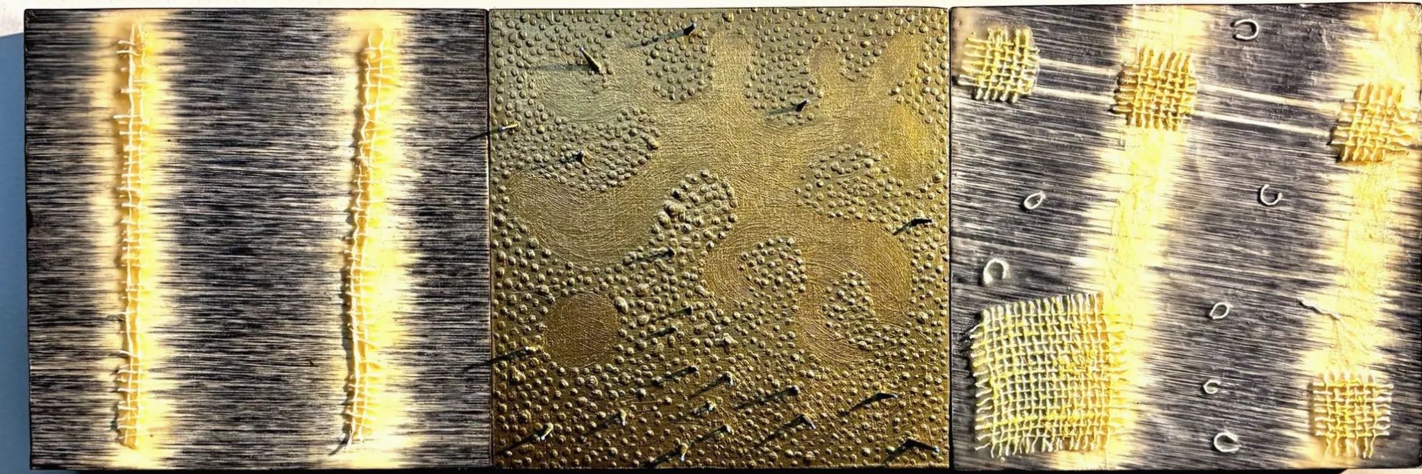 Abstract triptych artwork with textured patterns and yellow highlights on dark backgrounds.