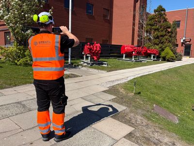 Strata Asbestos Surveyor taking a photo during an asbestos survey