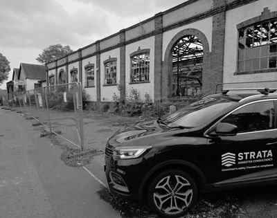 Strata Asbestos Consultancy survey vehicle attending a commercial asbestos survey.