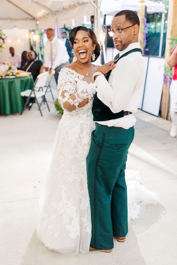 Newlyweds exchanging laughter during toasts!