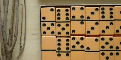 Buttercream colored antique dominoes.