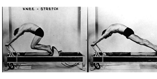 Joseph Pilates doing Knees Off in the Knee Stretch Series