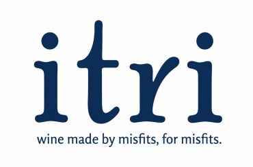 Logo reading 'itri' with tagline about wine and misfits.